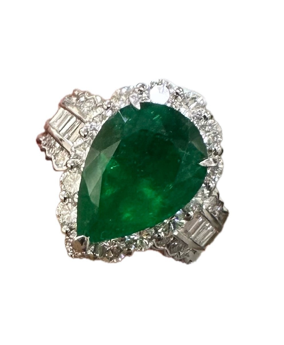 A Superb 6.30ct Muzo Colombia Emerald & Diamond Ring