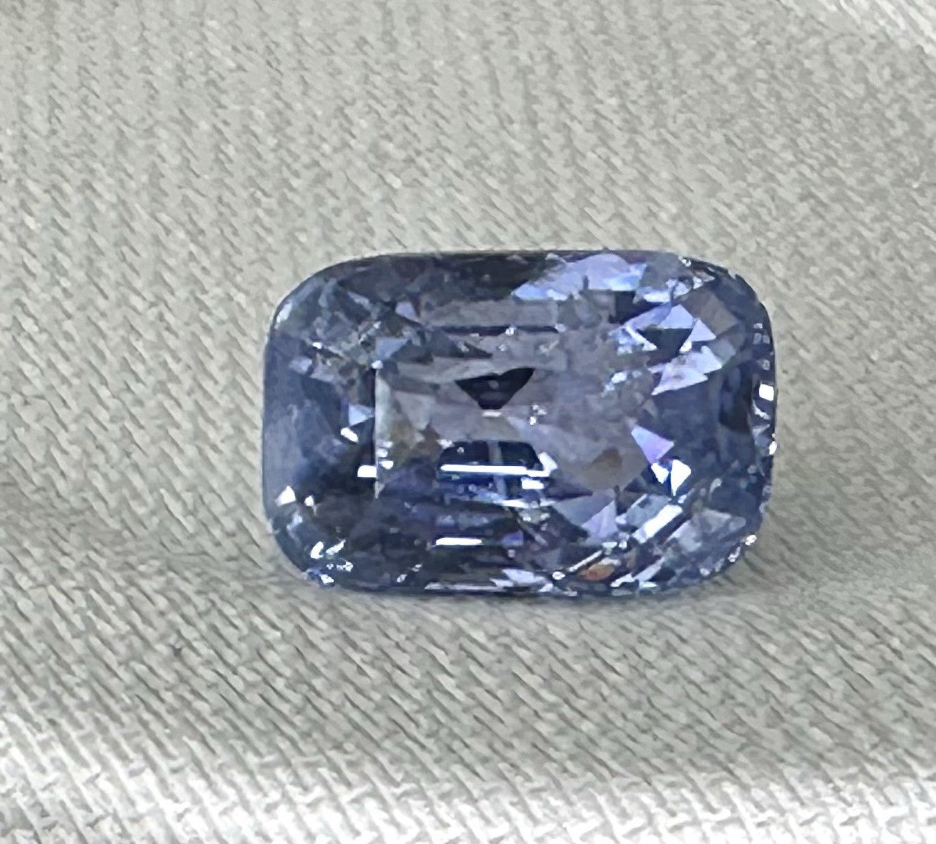 A Stunning Unheated 24.47ct Sri Lankan Violet Blue Sapphire