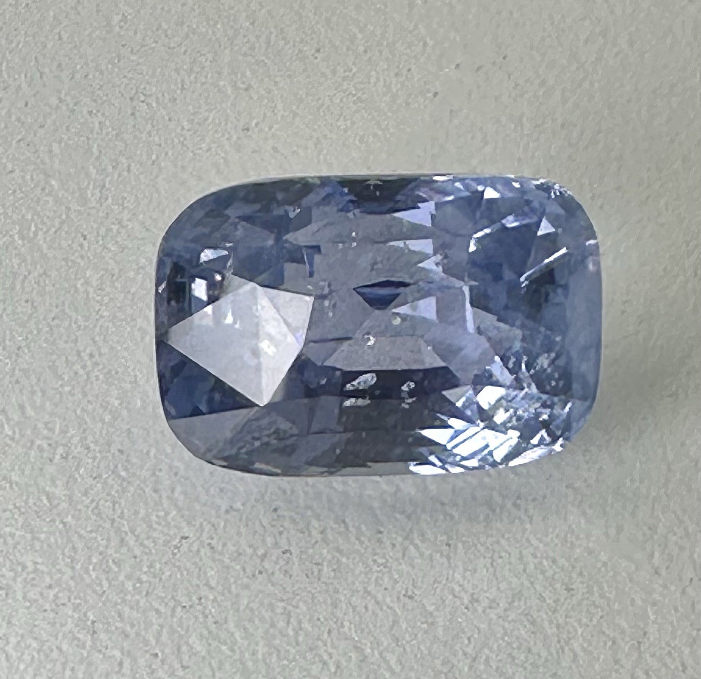 A Stunning Unheated 24.47ct Sri Lankan Violet Blue Sapphire