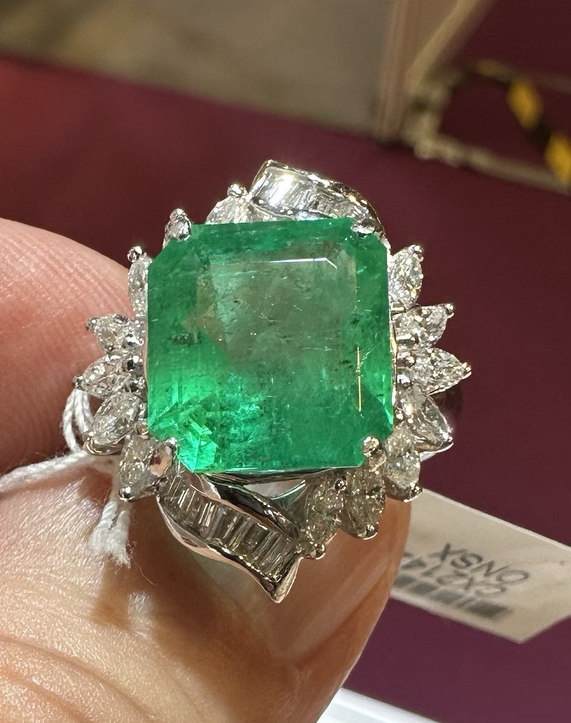A Wonderful 6.76ct Colombia Emerald & Diamond Ring
