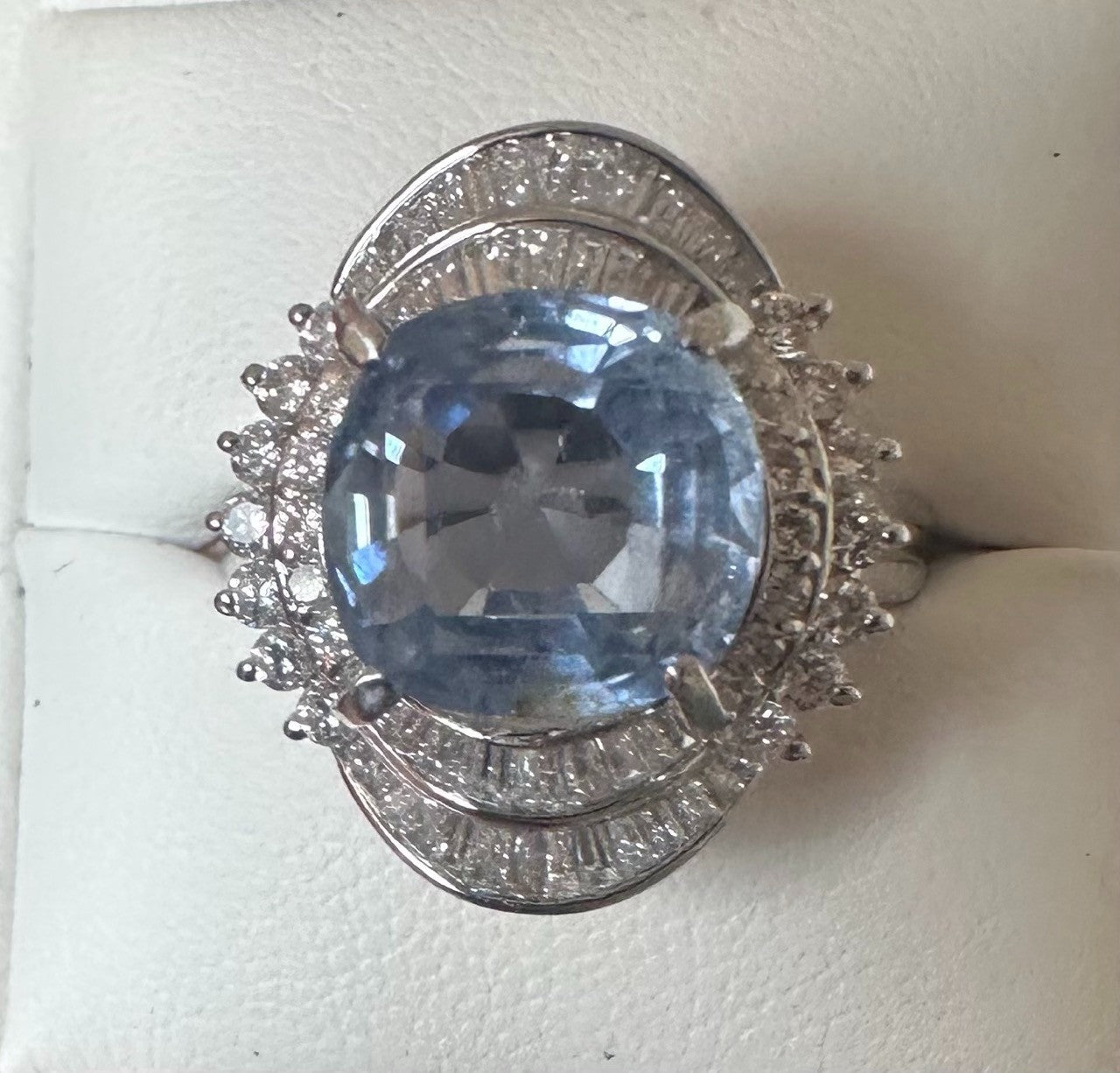 An Impressive Unheated 7.52ct Light Blue Sapphire Platinum & Diamond Ring