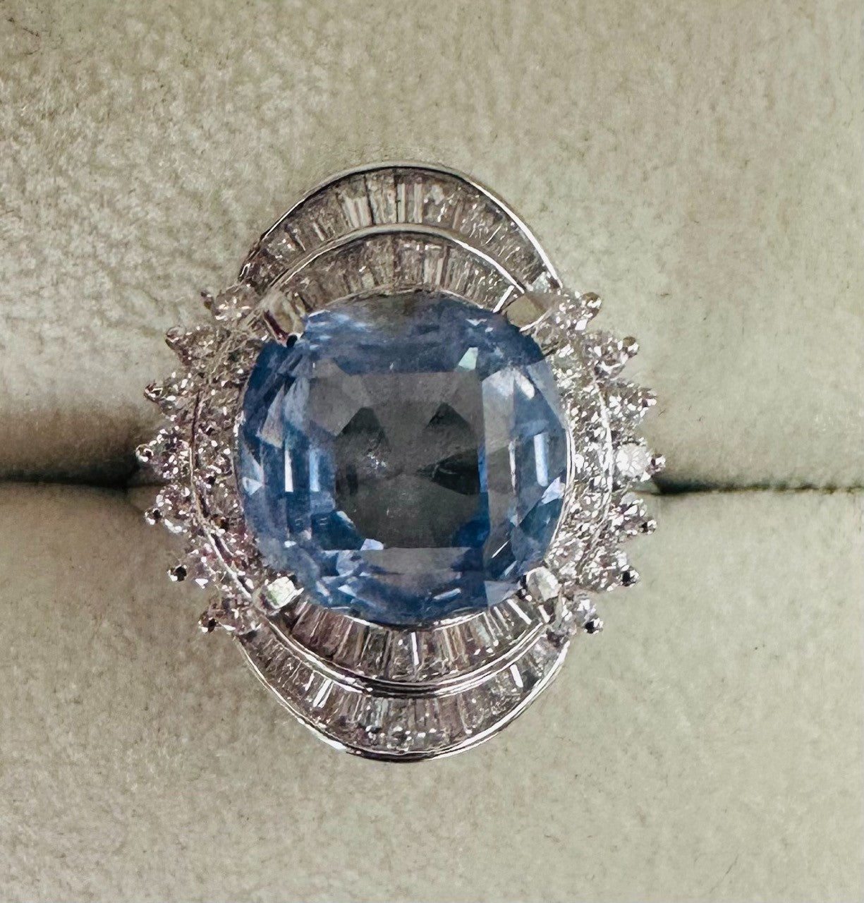 An Impressive Unheated 7.52ct Light Blue Sapphire Platinum & Diamond Ring