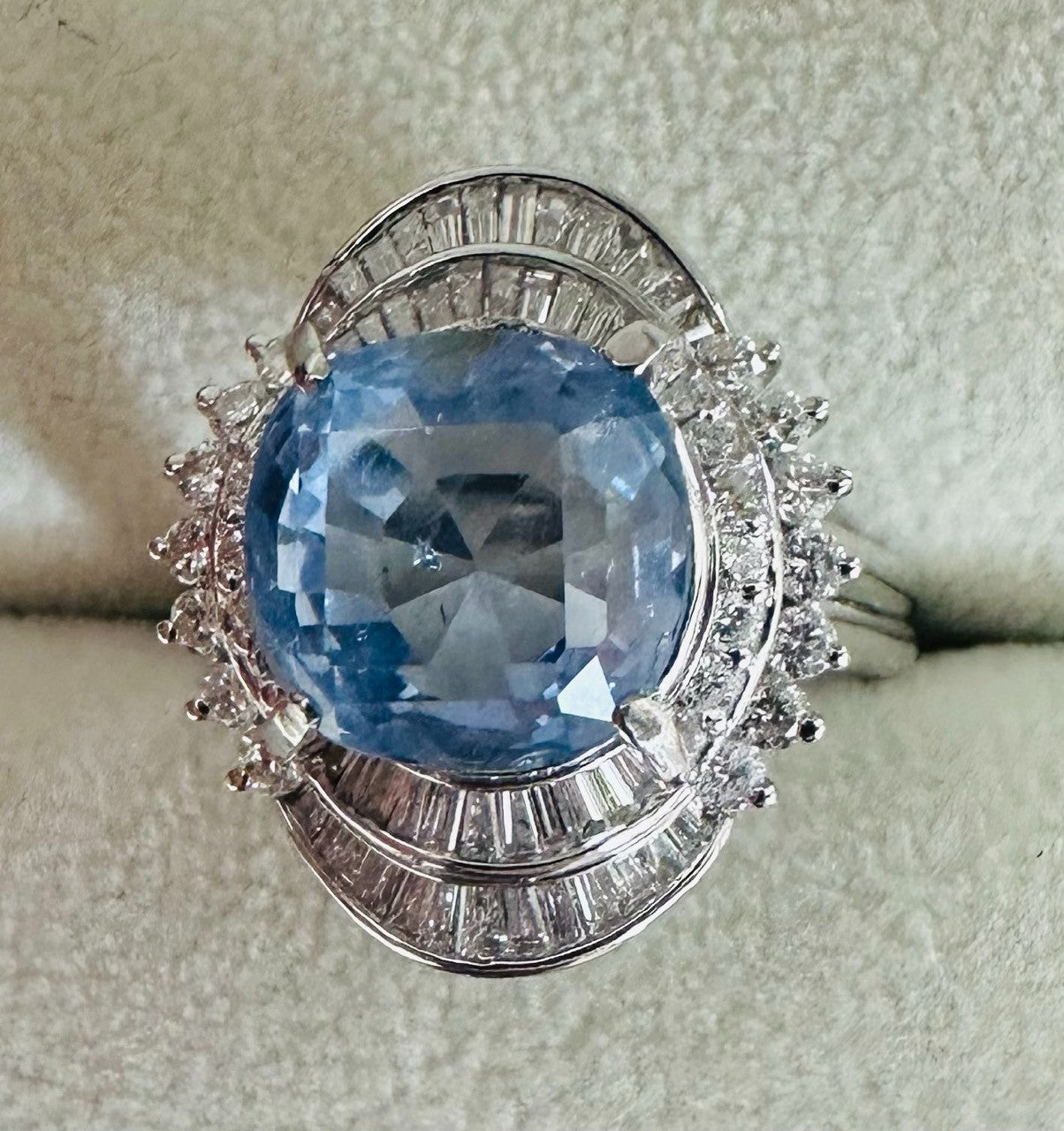 An Impressive Unheated 7.52ct Light Blue Sapphire Platinum & Diamond Ring