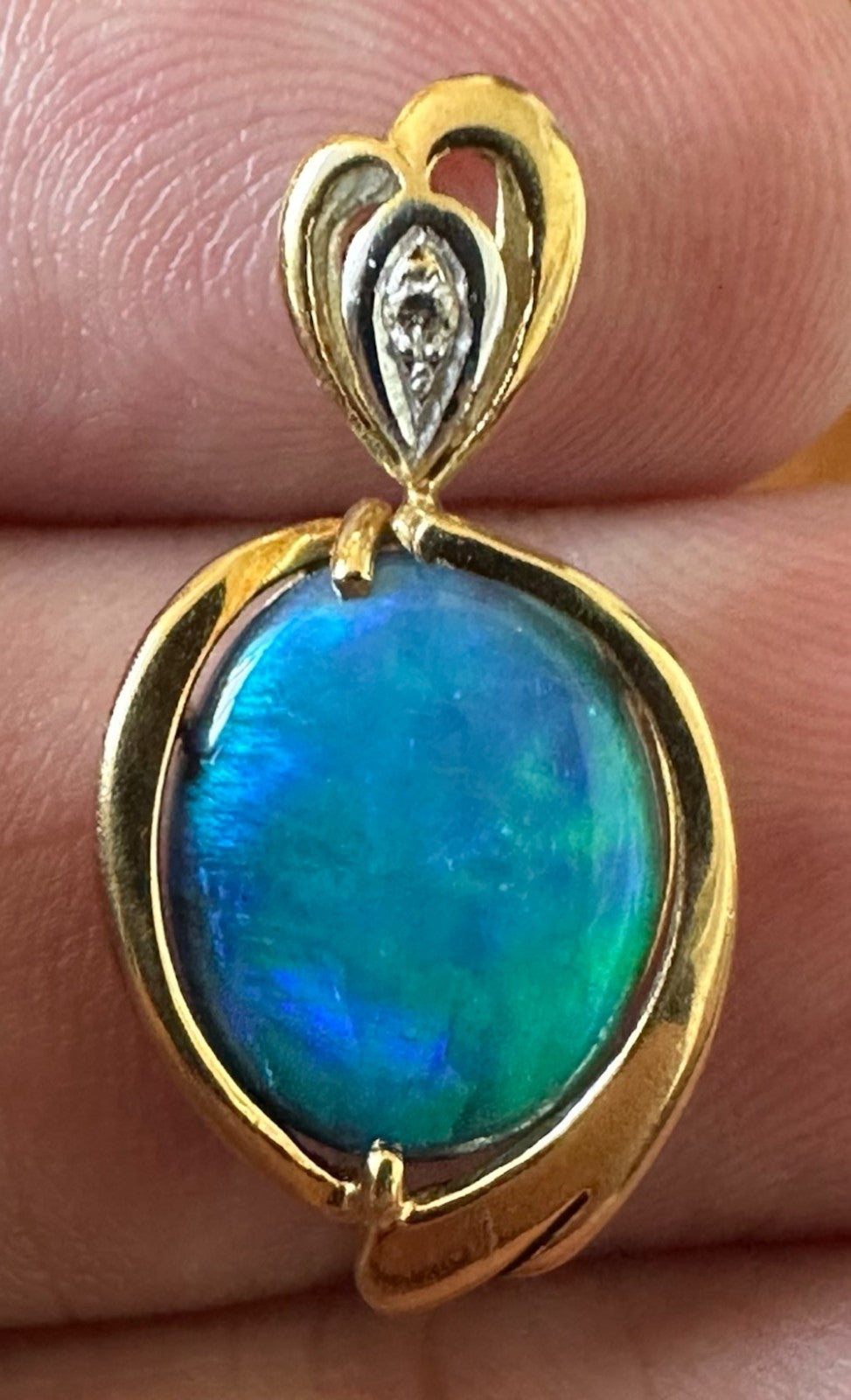 An Exquisite Australian Black Opal & Diamond 18k Pendant