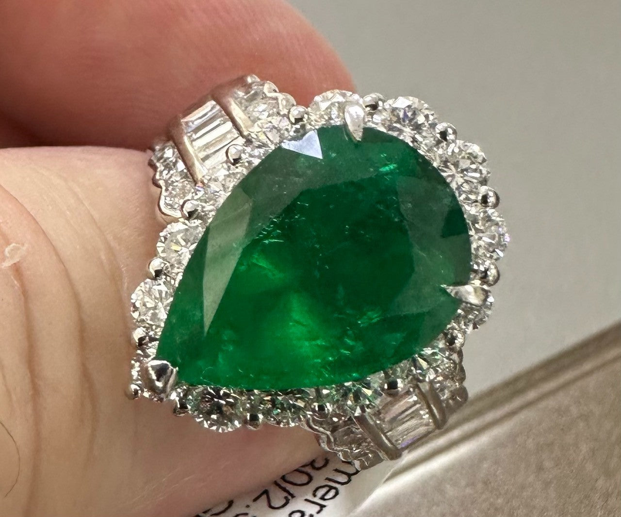 A Superb 6.30ct Muzo Colombia Emerald & Diamond Ring