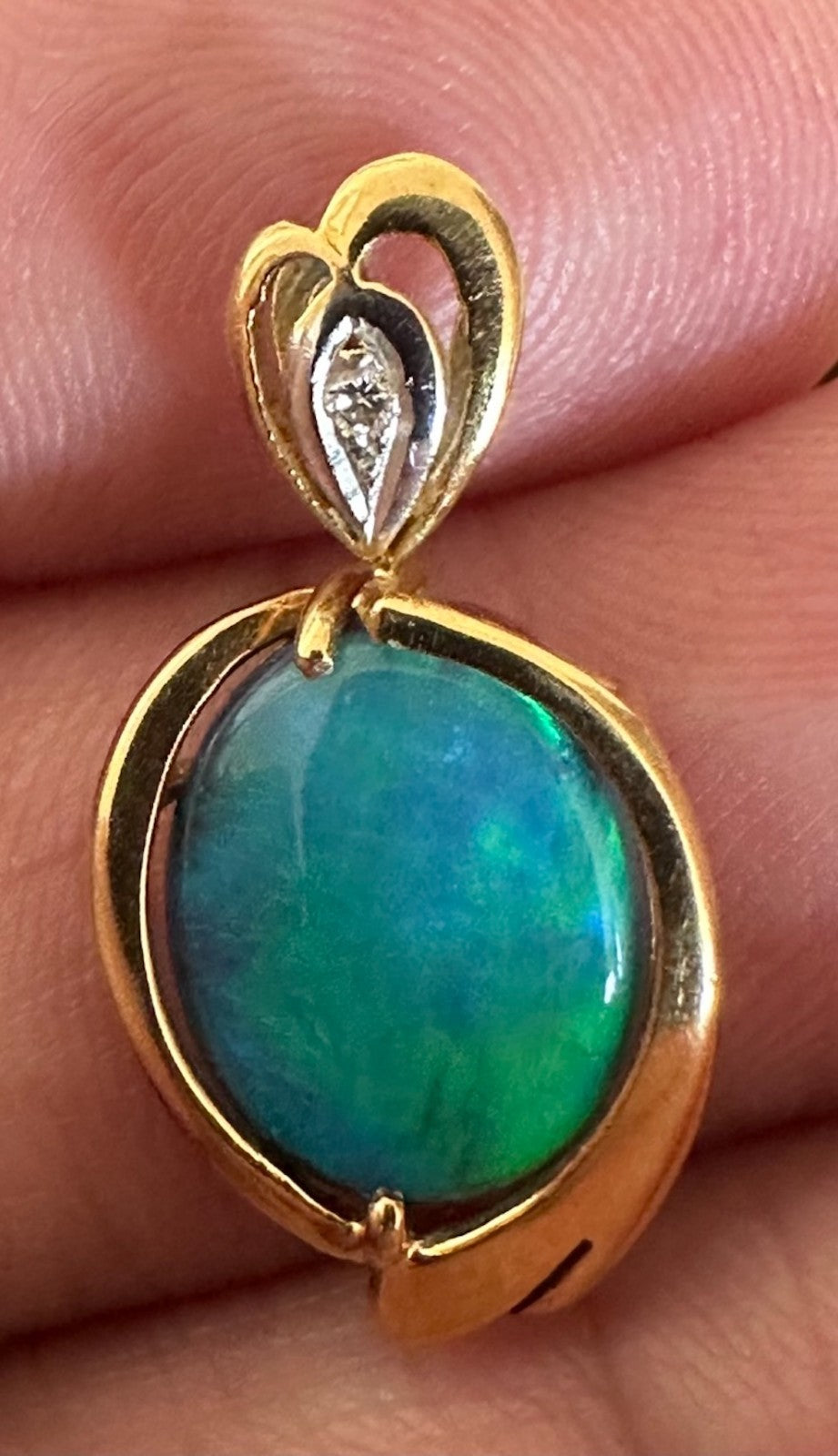 An Exquisite Australian Black Opal & Diamond 18k Pendant