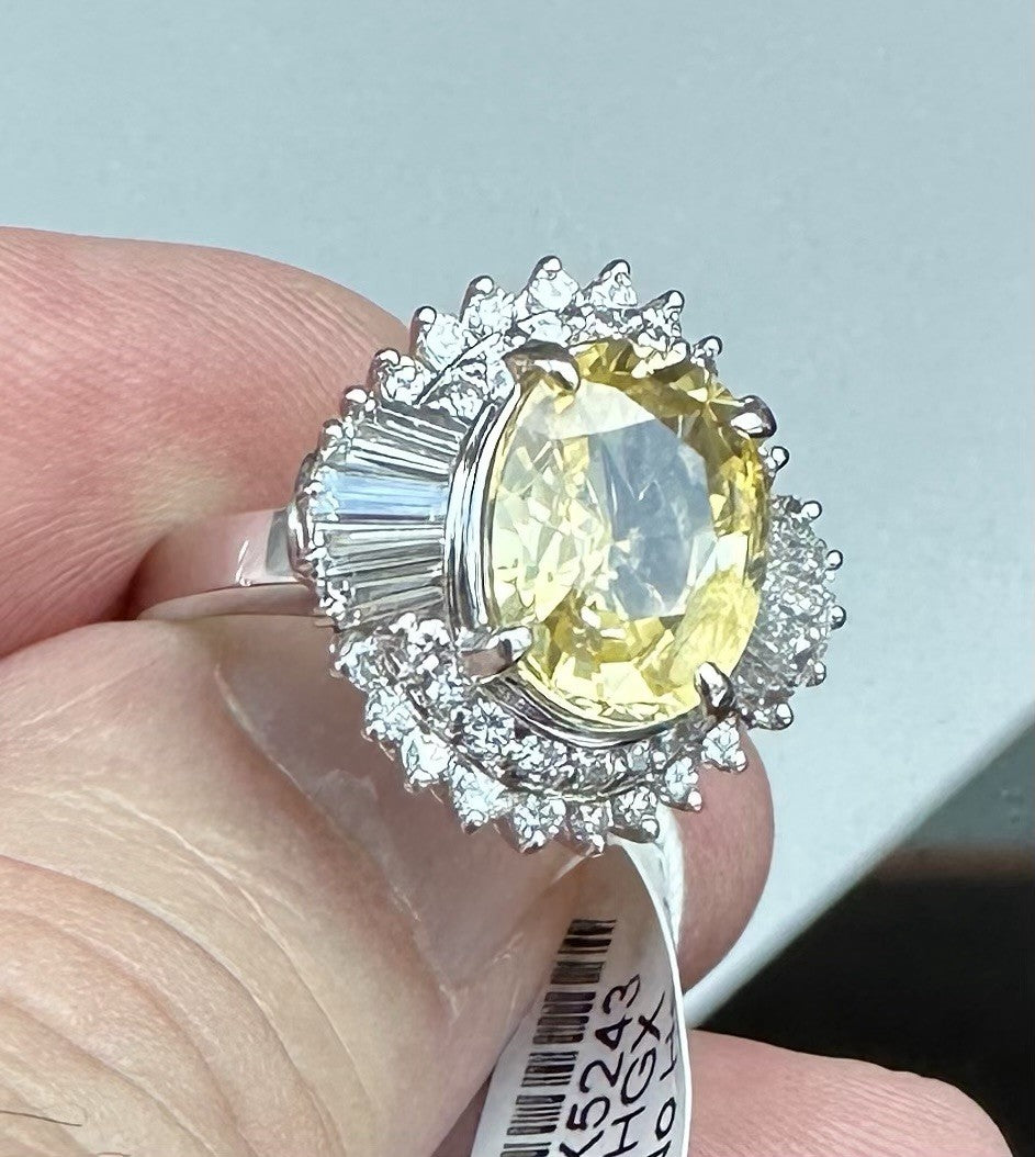 An Exquisite 4.81ct Unheated Lemon Yellow Sapphire Platinum & Diamond Ring