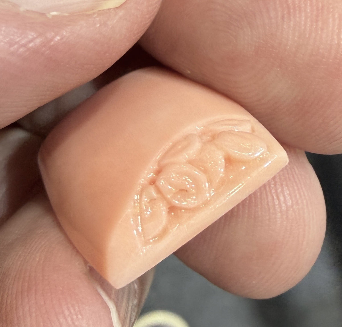 A Beautiful Pair of Carved Angel Skin Coral For Earrings