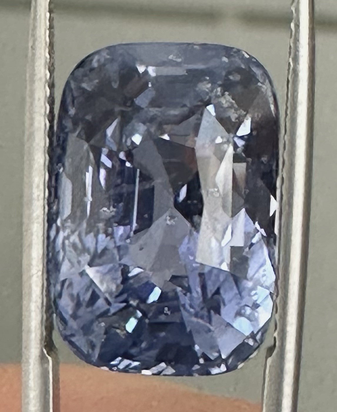 A Stunning Unheated 24.47ct Sri Lankan Violet Blue Sapphire