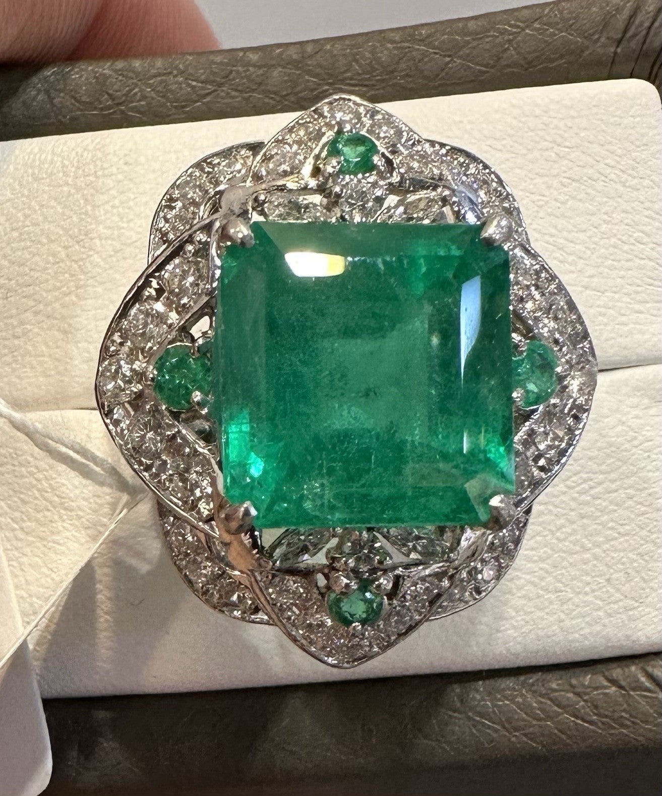 An Extraordinary 11.10ct Colombia Emerald & Diamond Platinum Ring