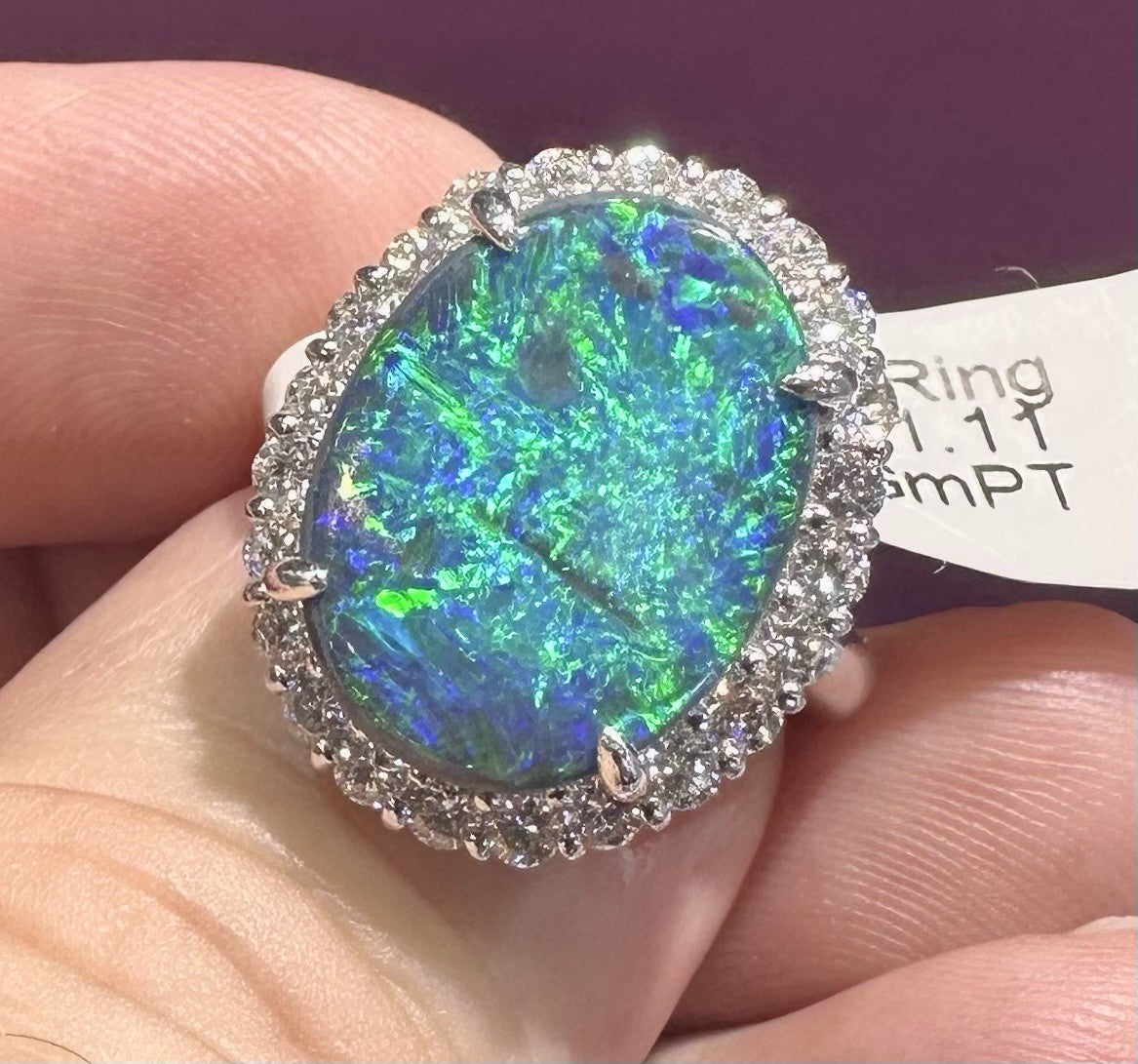 A Magnificent 6.25ct Australian Black Opal & Diamond Platinum Ring