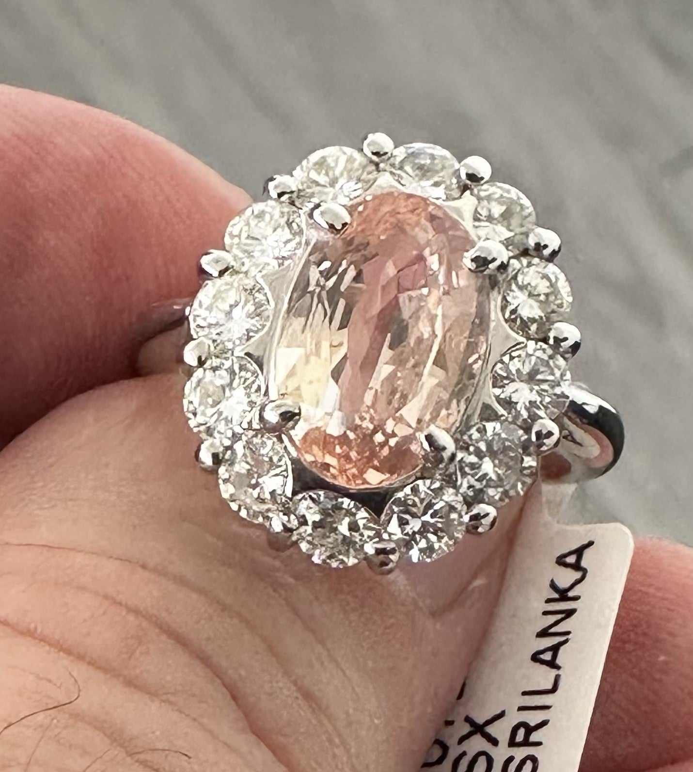 An Extraordinary Unheated 3.91ct Padparadscha Sapphire & Diamond Ring GIA