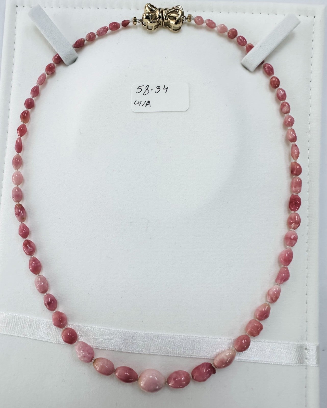 A Magnificent 58.34ct Conch Pearl Necklace GIA Certificate