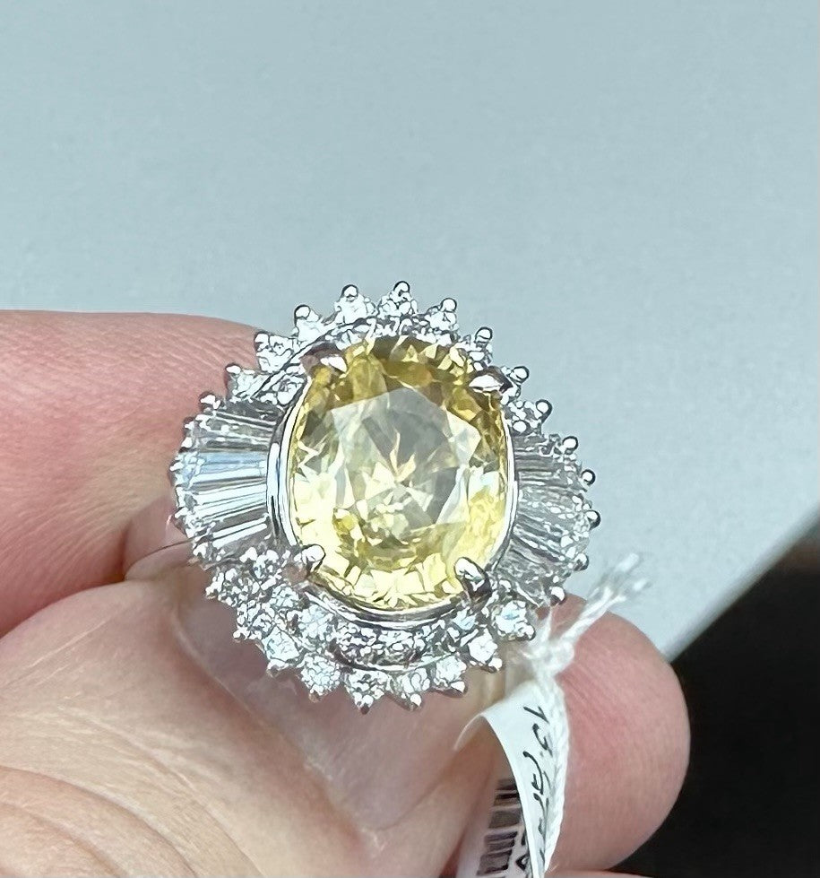 An Exquisite 4.81ct Unheated Lemon Yellow Sapphire Platinum & Diamond Ring