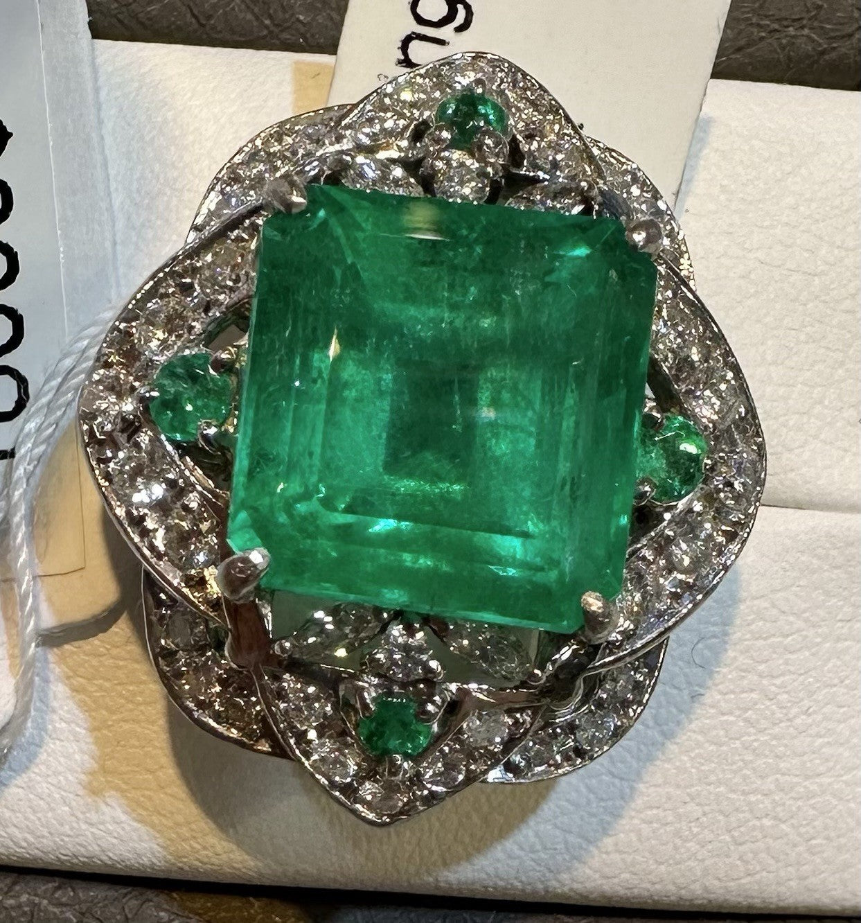 An Extraordinary 11.10ct Colombia Emerald & Diamond Platinum Ring