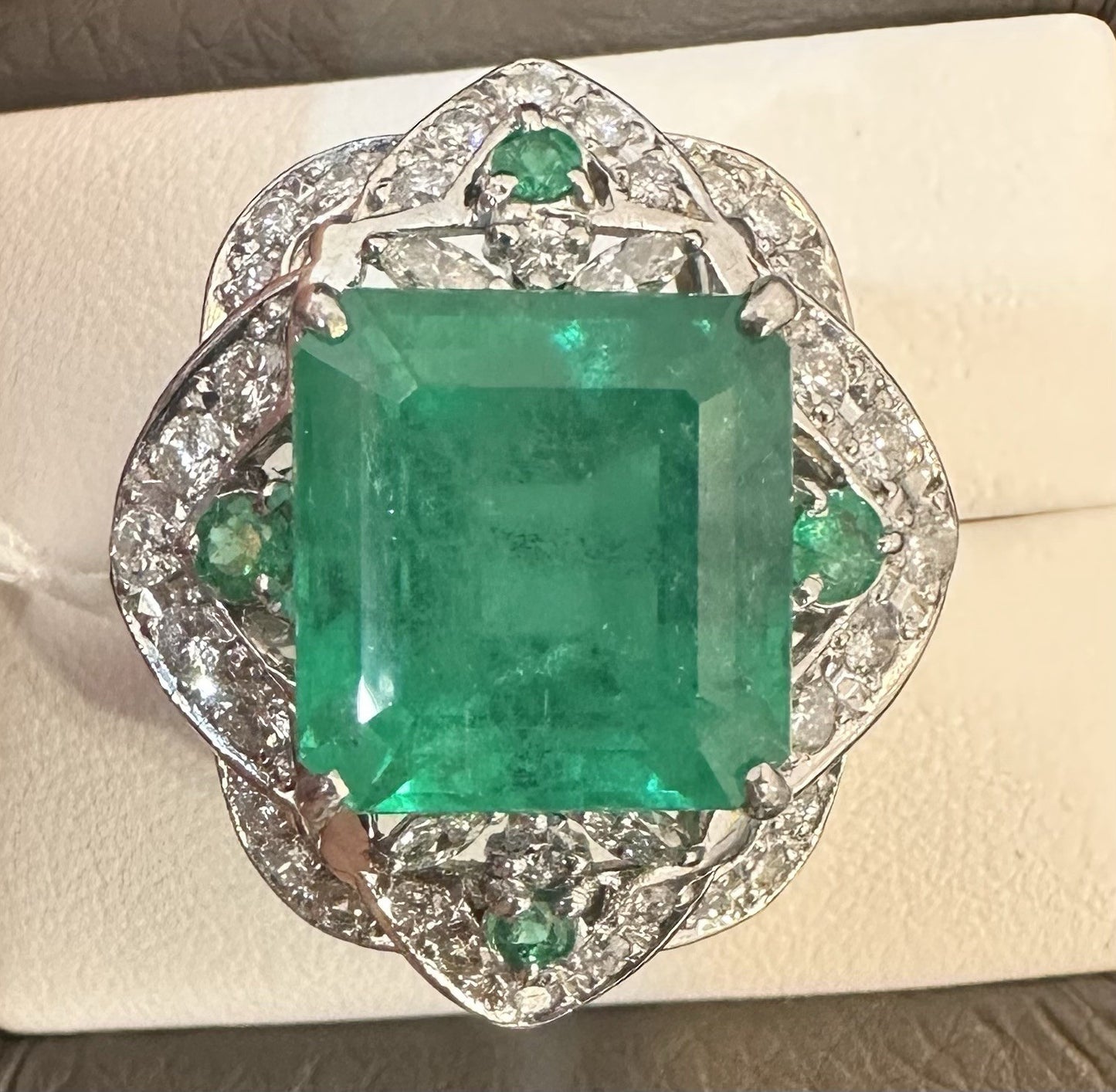 An Extraordinary 11.10ct Colombia Emerald & Diamond Platinum Ring