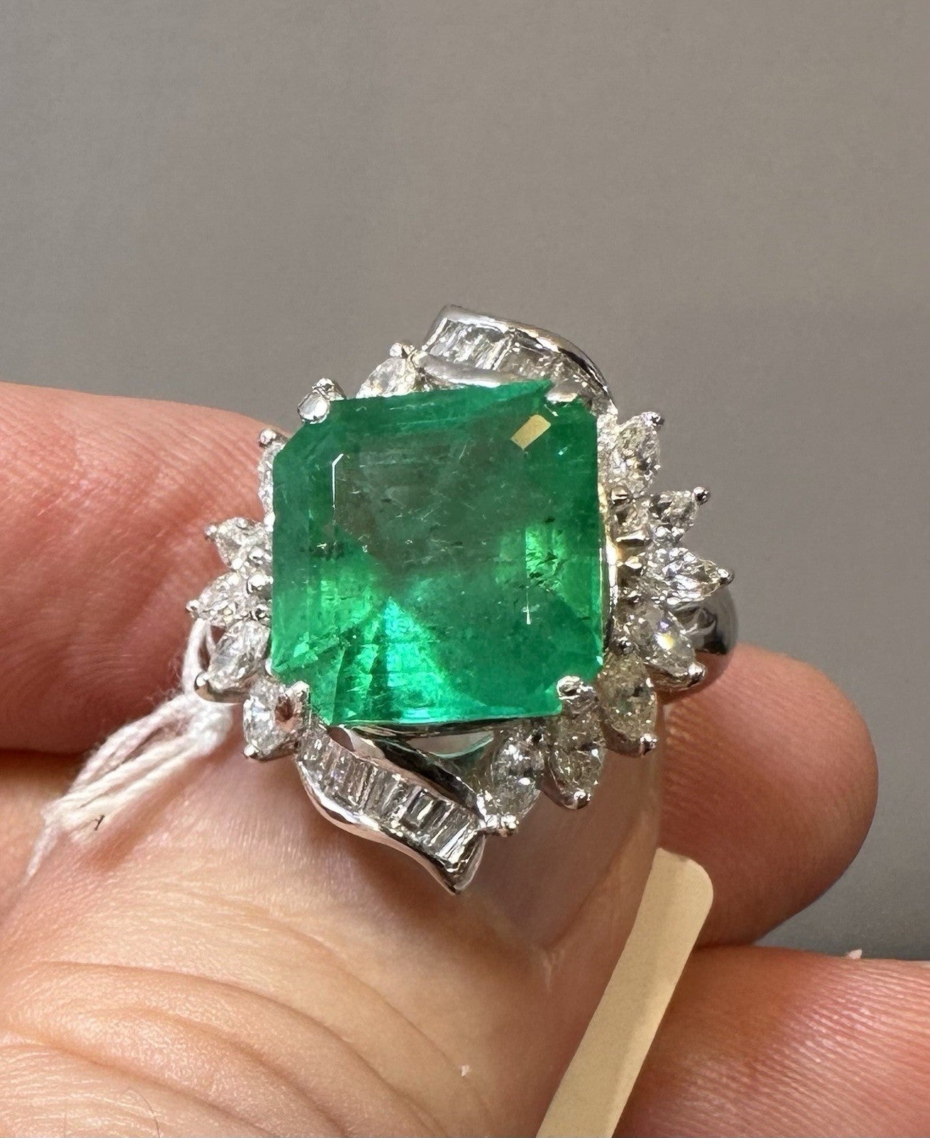 A Wonderful 6.76ct Colombia Emerald & Diamond Ring