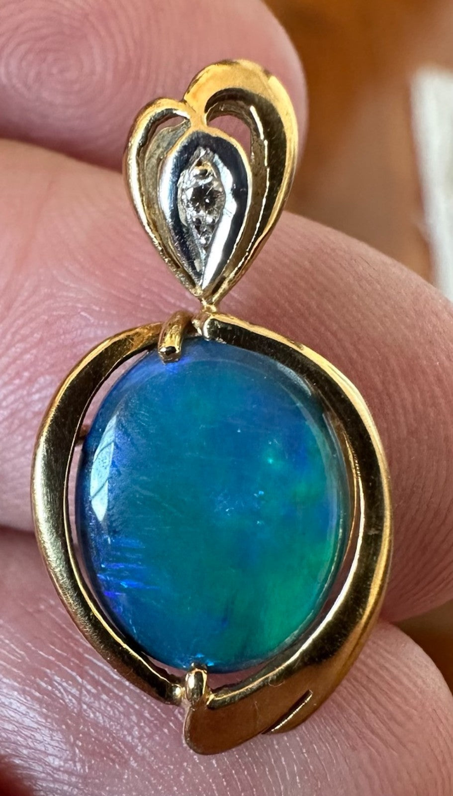 An Exquisite Australian Black Opal & Diamond 18k Pendant