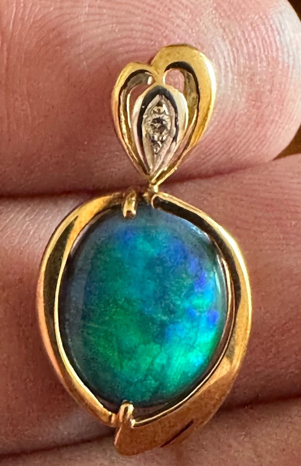 An Exquisite Australian Black Opal & Diamond 18k Pendant