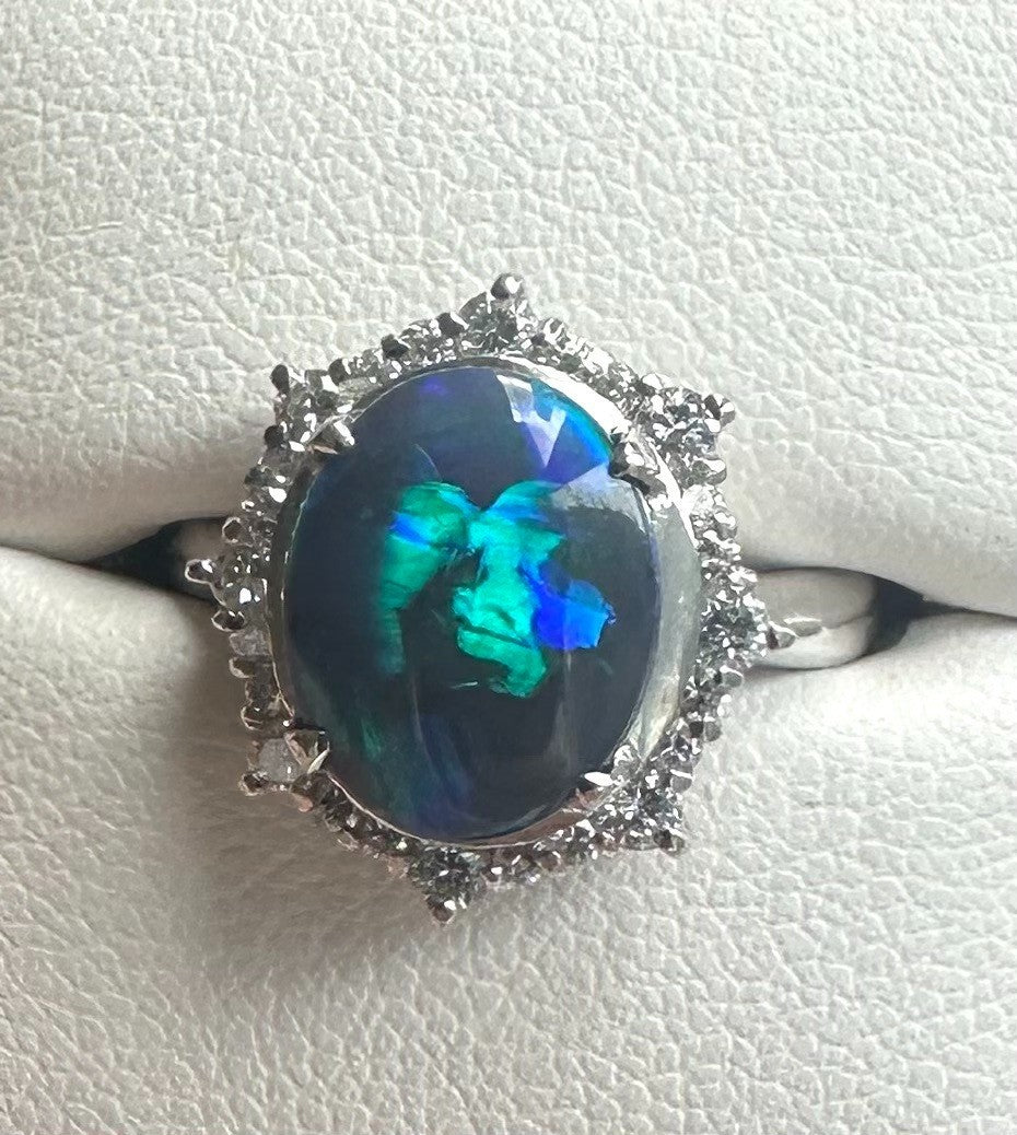 An Exquisite 2.35ct Australian Black Opal & Diamond Platinum Ring