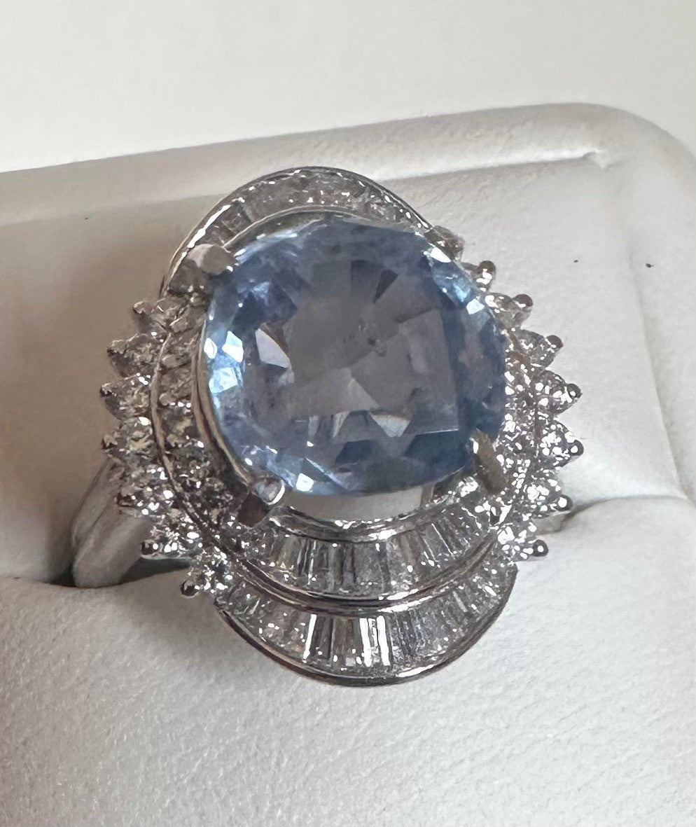 An Impressive Unheated 7.52ct Light Blue Sapphire Platinum & Diamond Ring