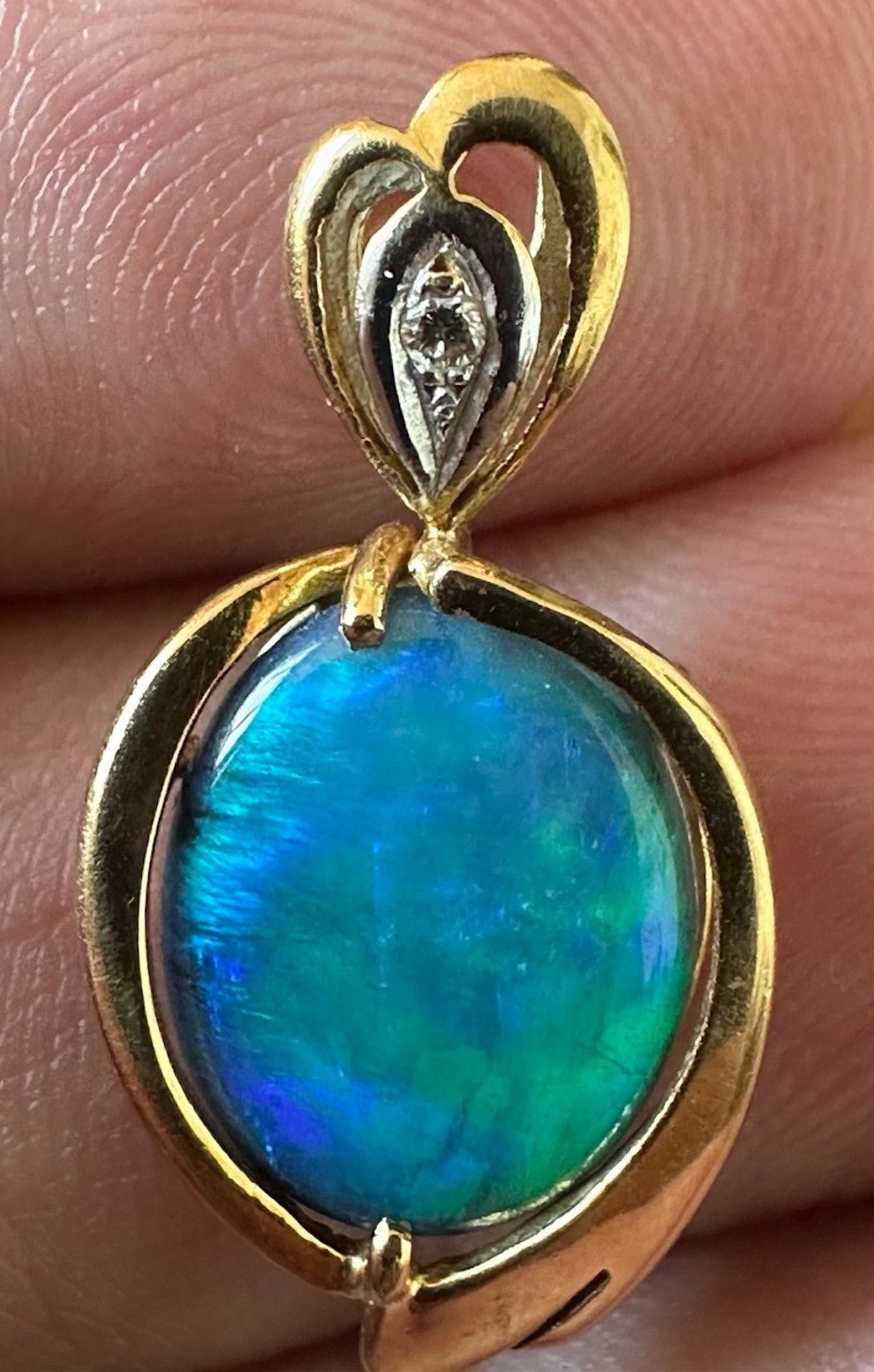 An Exquisite Australian Black Opal & Diamond 18k Pendant