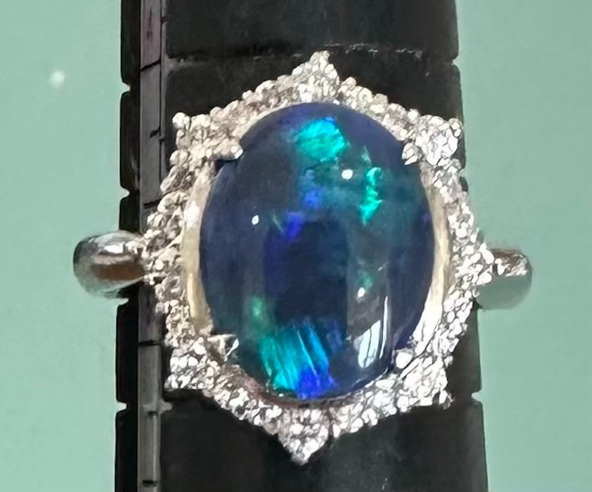 An Exquisite 2.35ct Australian Black Opal & Diamond Platinum Ring
