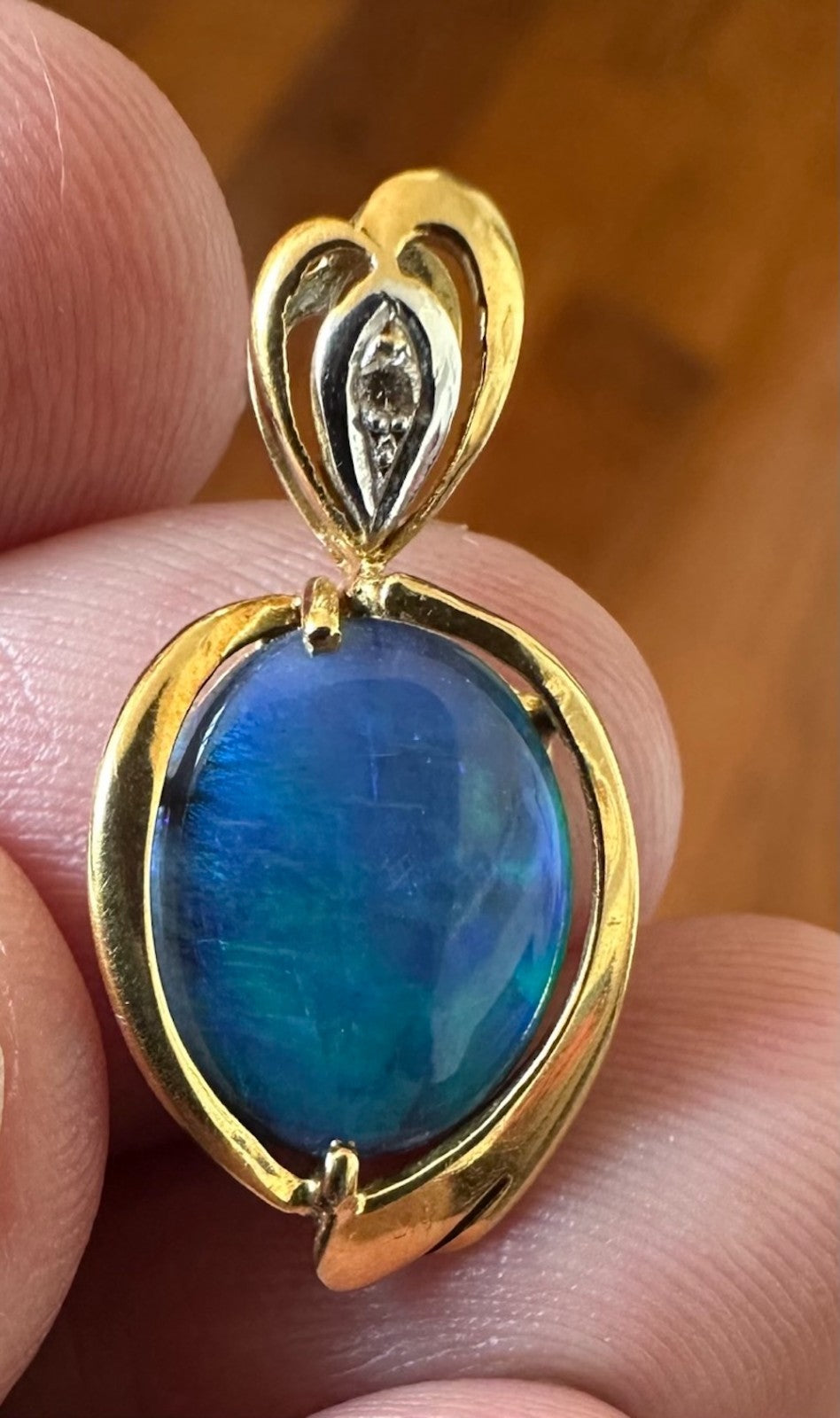 An Exquisite Australian Black Opal & Diamond 18k Pendant