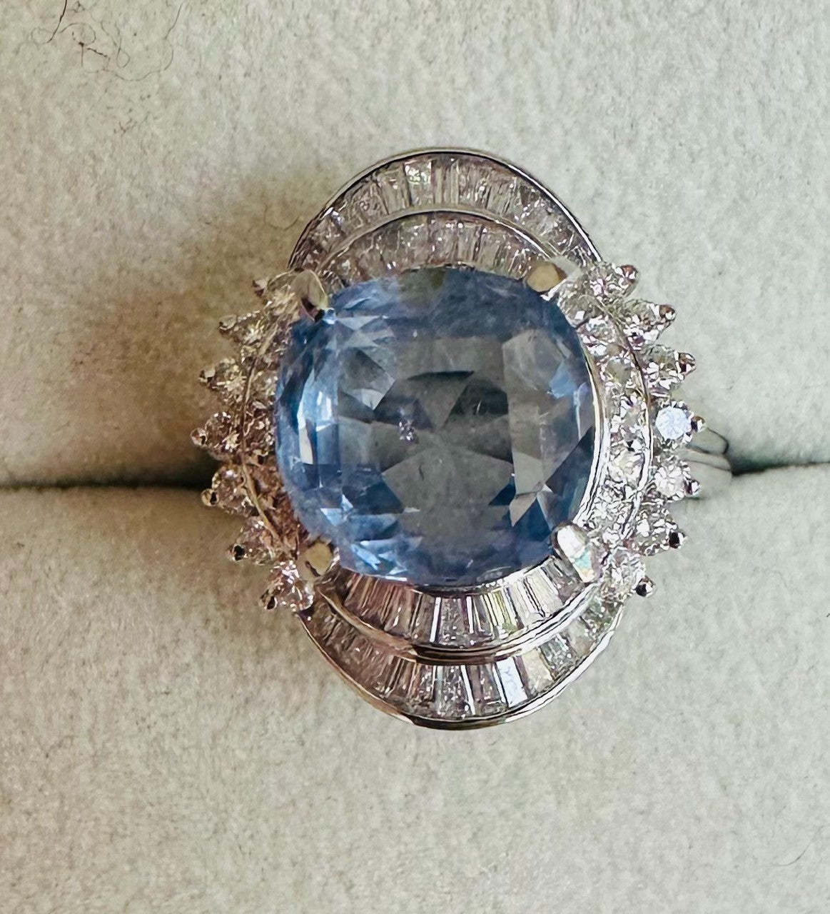 An Impressive Unheated 7.52ct Light Blue Sapphire Platinum & Diamond Ring