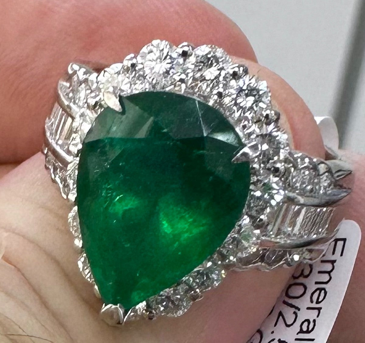 A Superb 6.30ct Muzo Colombia Emerald & Diamond Ring