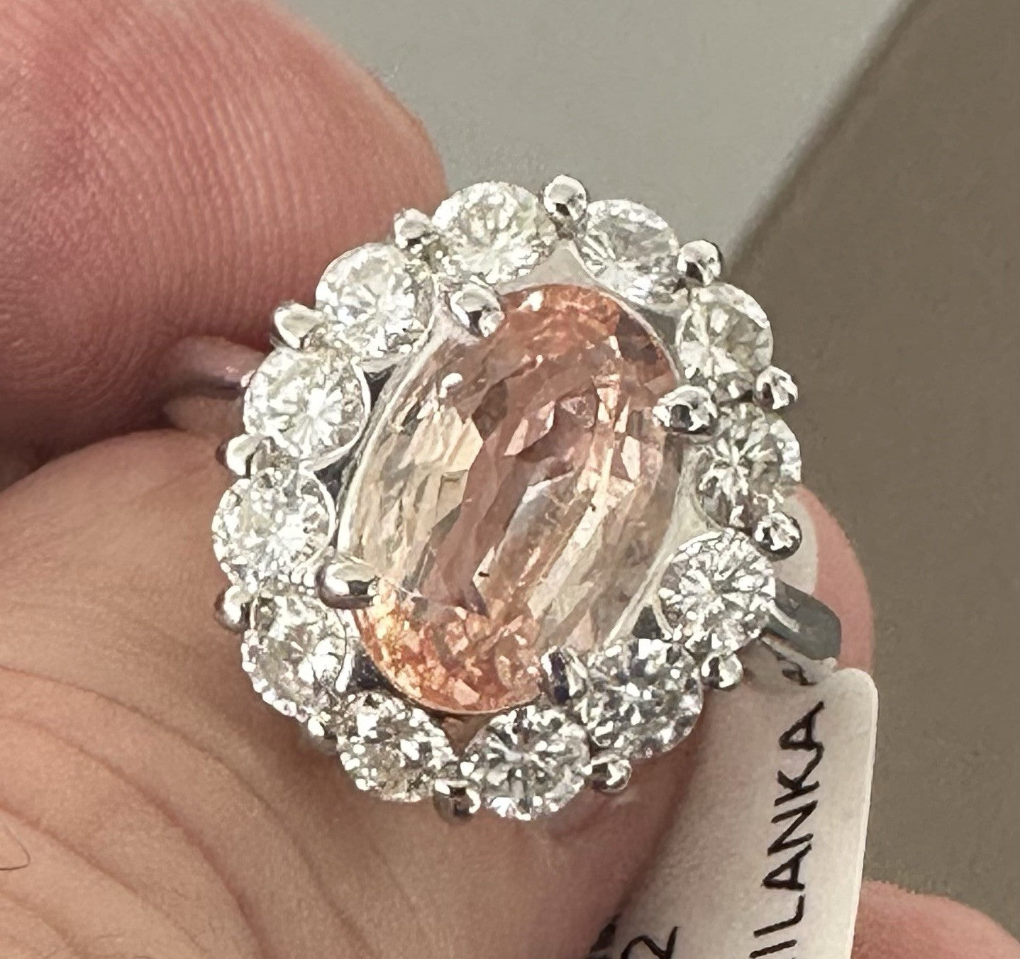 An Extraordinary Unheated 3.91ct Padparadscha Sapphire & Diamond Ring GIA