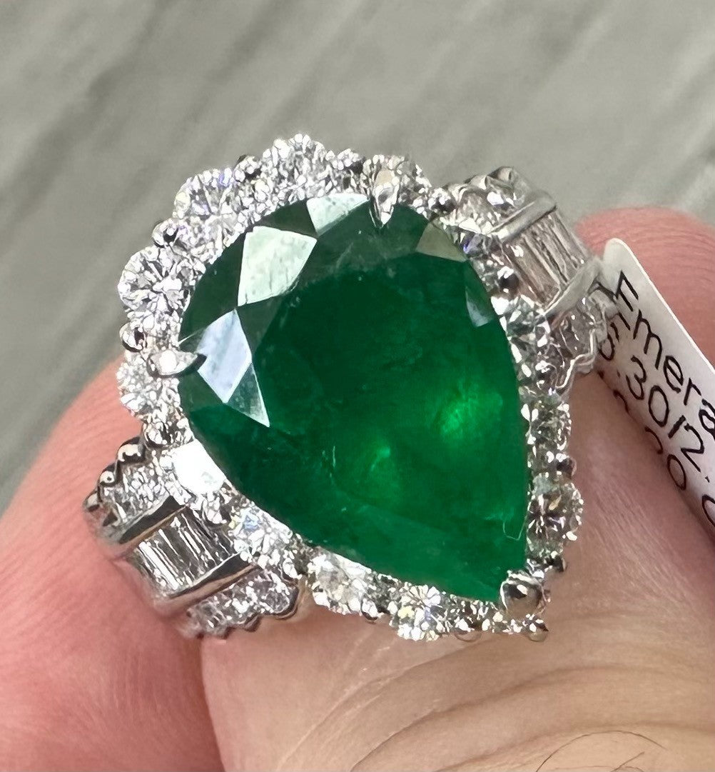 A Superb 6.30ct Muzo Colombia Emerald & Diamond Ring