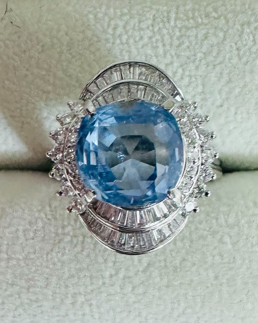 An Impressive Unheated 7.52ct Light Blue Sapphire Platinum & Diamond Ring