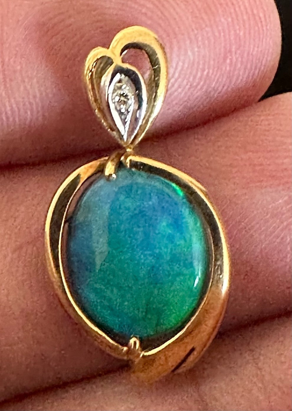 An Exquisite Australian Black Opal & Diamond 18k Pendant