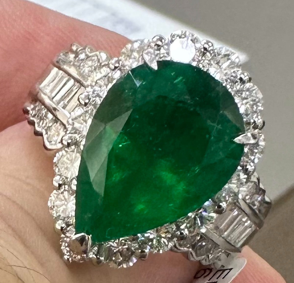 A Superb 6.30ct Muzo Colombia Emerald & Diamond Ring