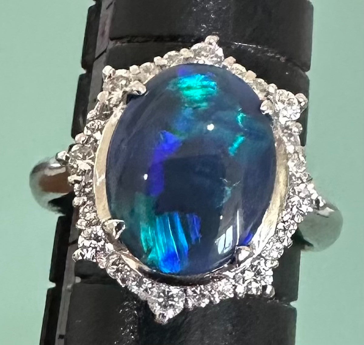 An Exquisite 2.35ct Australian Black Opal & Diamond Platinum Ring