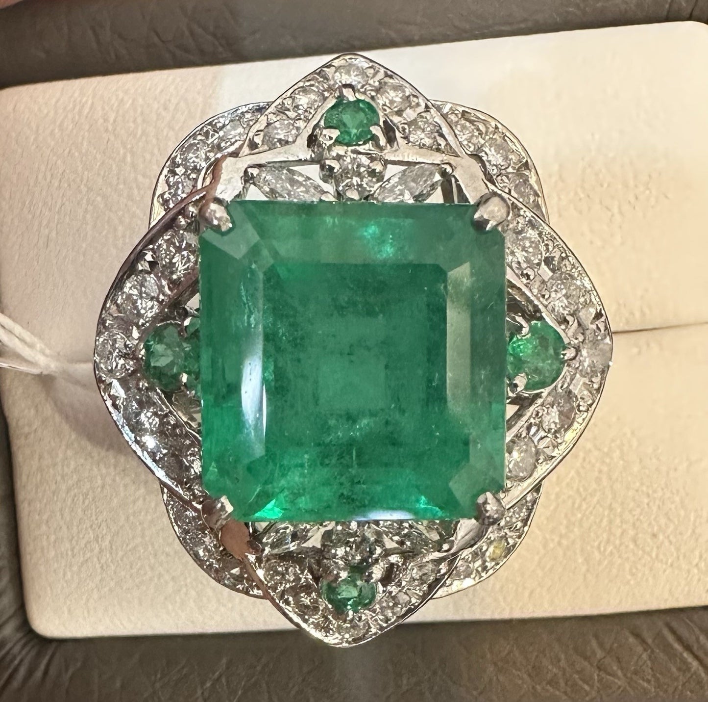 An Extraordinary 11.10ct Colombia Emerald & Diamond Platinum Ring