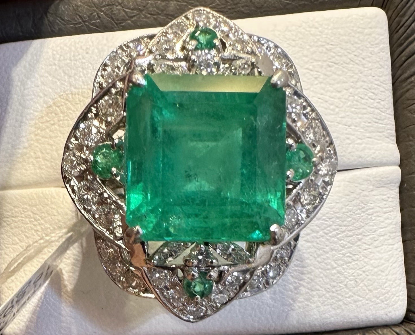 An Extraordinary 11.10ct Colombia Emerald & Diamond Platinum Ring