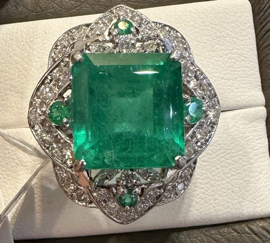 An Extraordinary 11.10ct Colombia Emerald & Diamond Platinum Ring