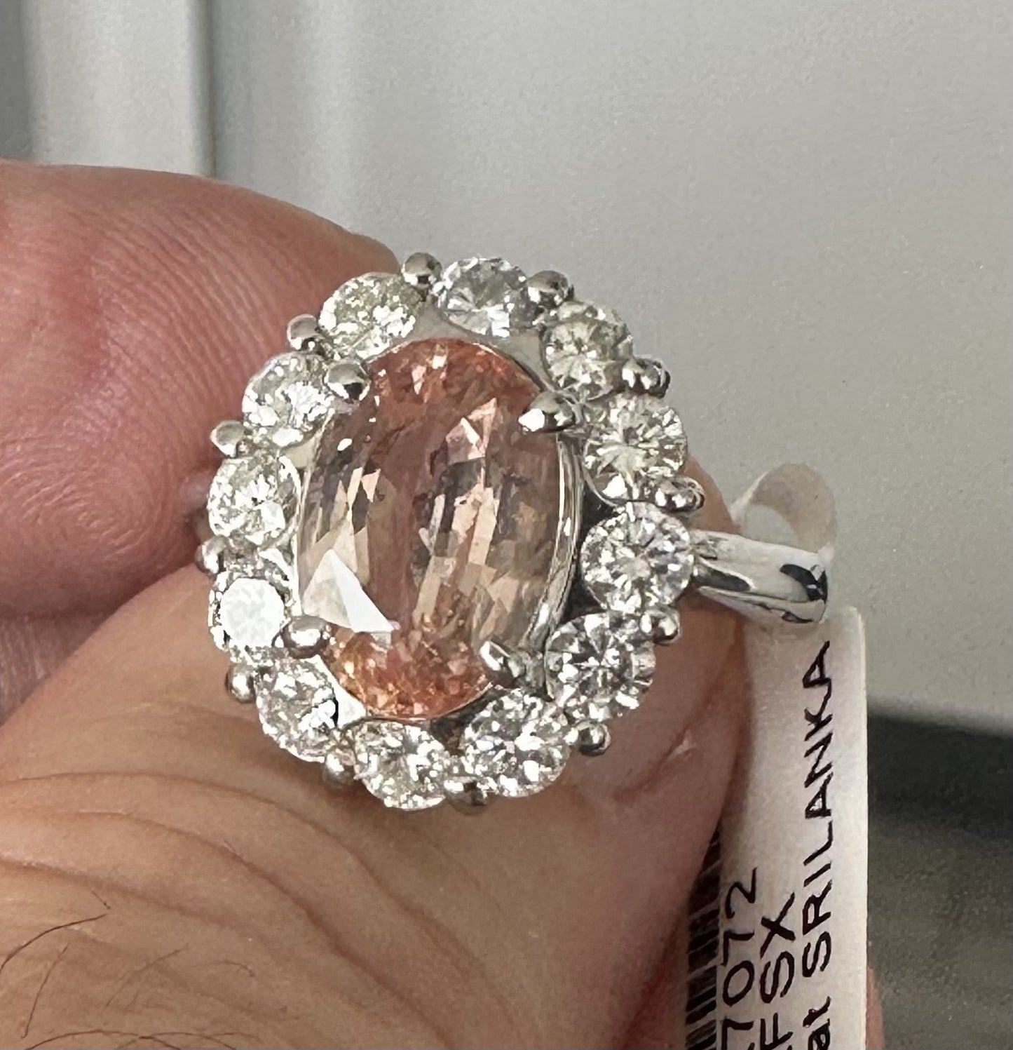 An Extraordinary Unheated 3.91ct Padparadscha Sapphire & Diamond Ring GIA