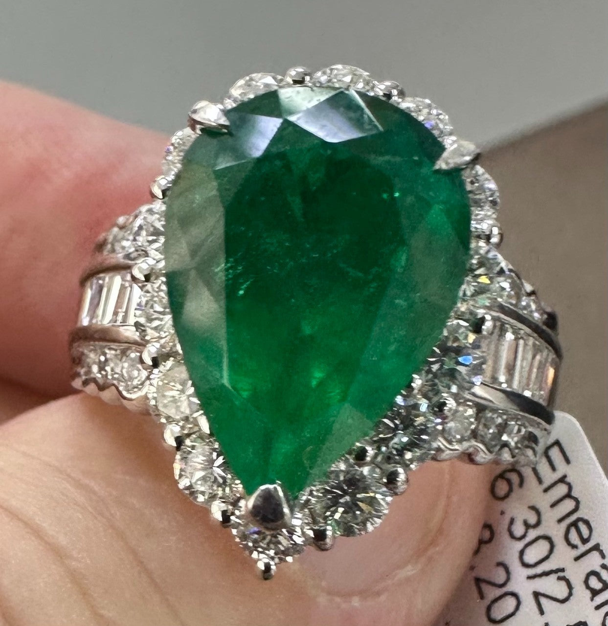 A Superb 6.30ct Muzo Colombia Emerald & Diamond Ring