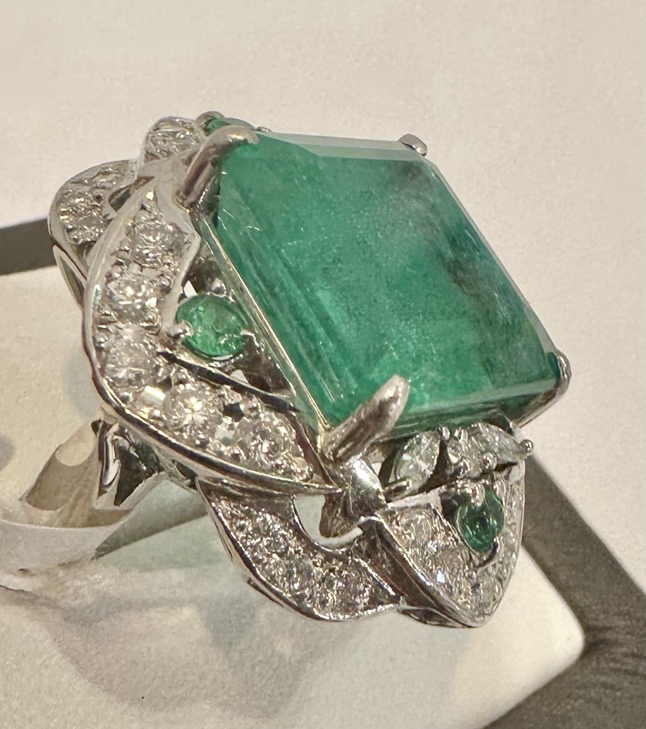 An Extraordinary 11.10ct Colombia Emerald & Diamond Platinum Ring